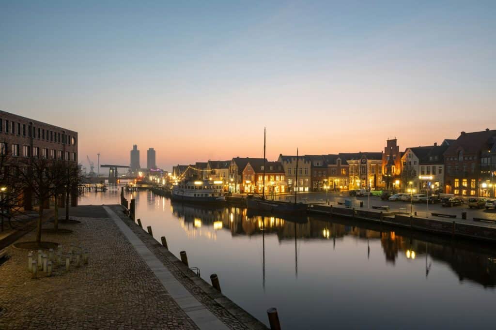 Beautiful view of ships docked in an inland port in Husum, Germany during a beautiful sunset